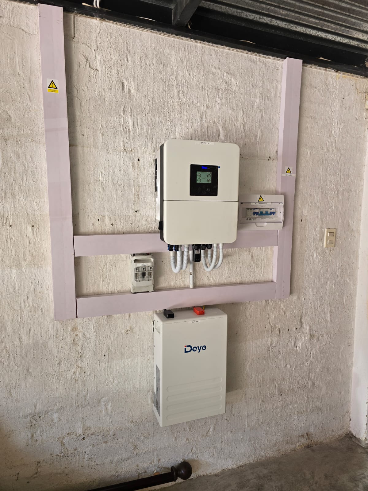 Hybrid inverter on concrete wall